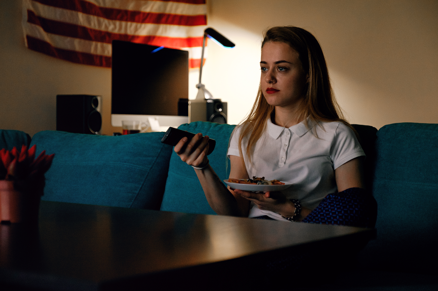 Girl Eating Pizza And Watching Tv