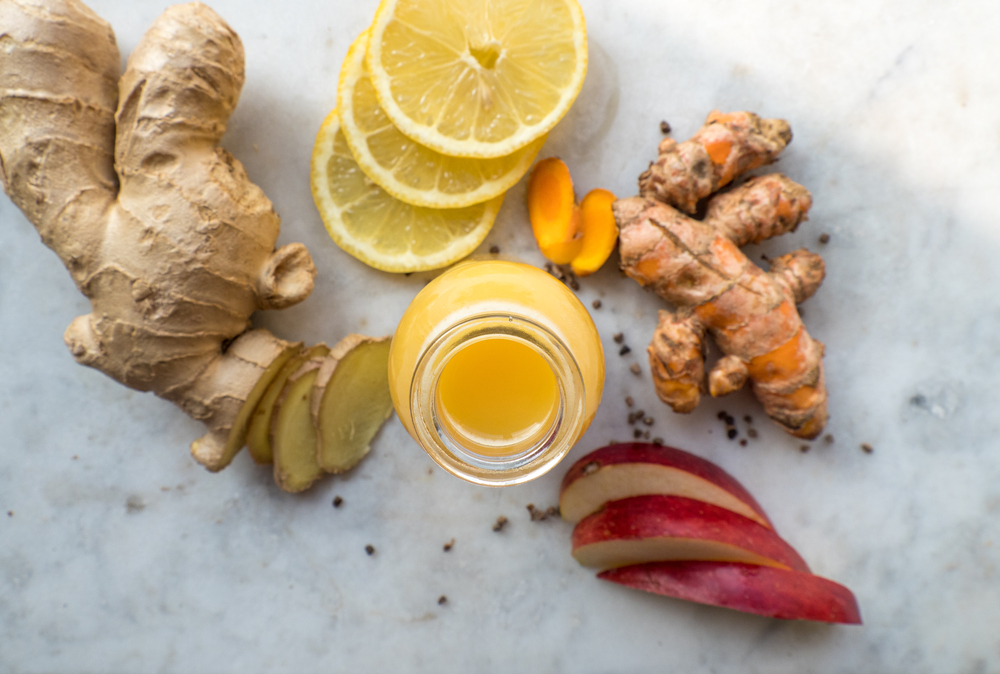 Immune System boosting Ginger, Turmeric, Lemon and Apple Shot in a glas bottle